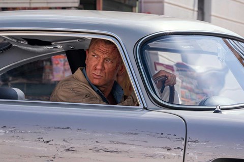 Daniel Craig as James Bond in his DB5