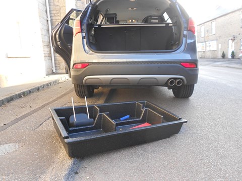 The removable under-floor storage cubby removes from Santa Fe's boot, making it deeper