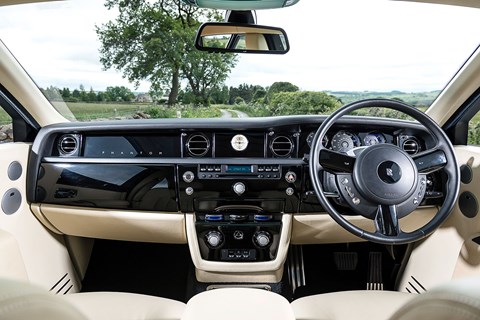 Thin-rimmed wheel and organ-stop controls legacies of the past. Rolls invented the luxury cabin, and it looked a bit like this
