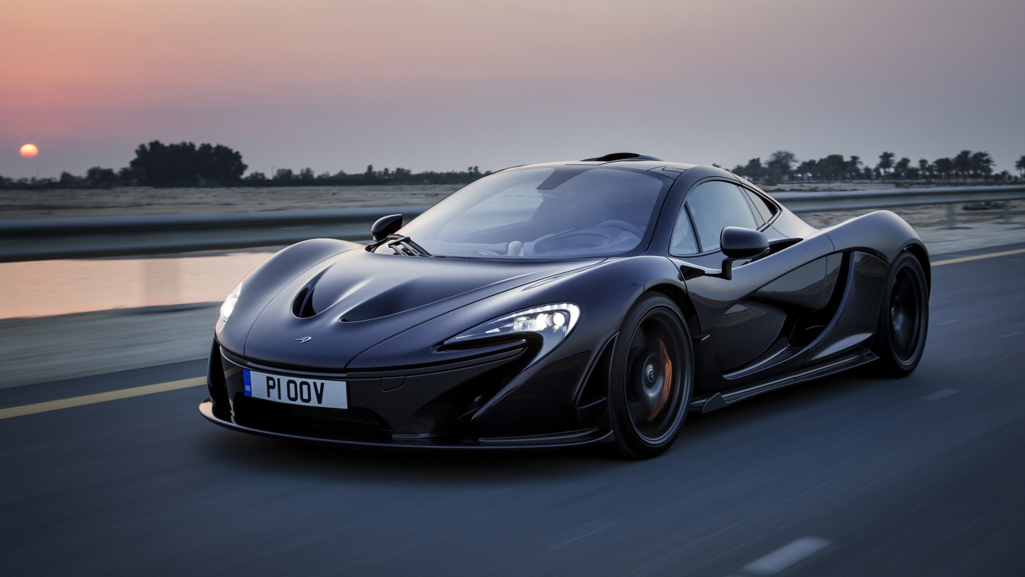 McLaren P1 review, Bahrain, black, front view, driving on the road