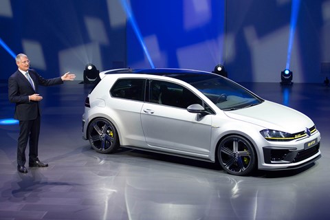 The concept VW Golf R400 and board member Heinz-Jakob Neusser, who confirmed the project's green light to CAR magazine