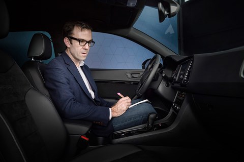 Author Tim Pollard tries out the interior of the Cupra Ateca