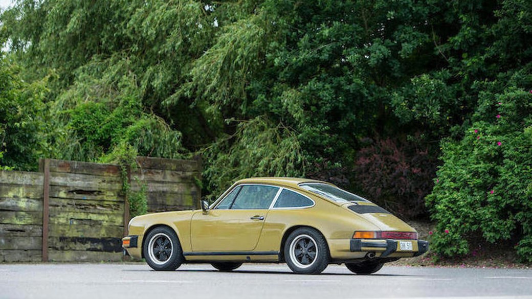 The olive green Porsche 911 from The Bridge will be auctioned for charity at the Bonhams auction at Goodwood