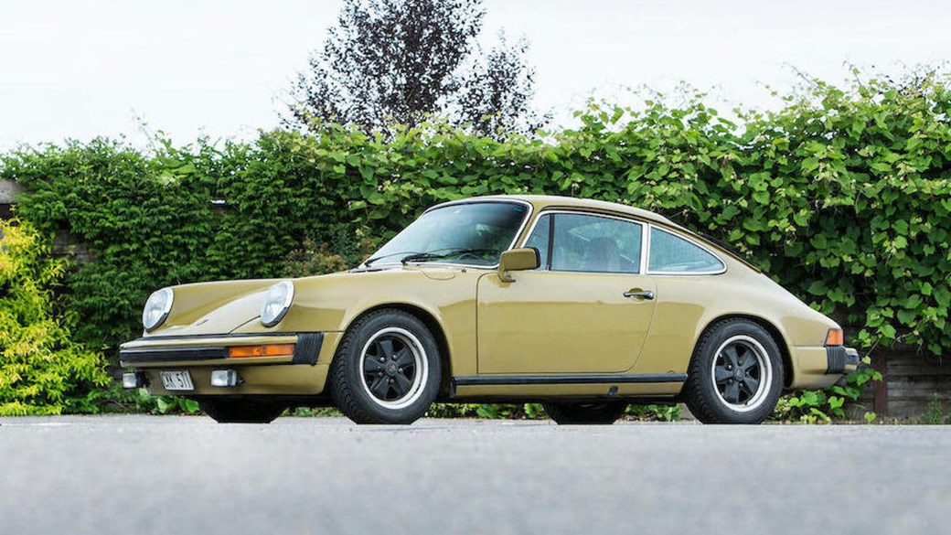 It's a 1977 Porsche 911 S manual, originally sold in the US