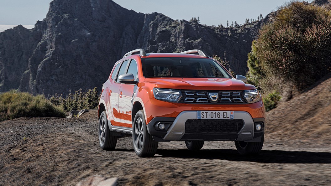 Dacia Duster (2021) driving through mountains