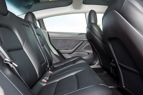 Tesla Model 3 rear seats: cleverly scalloped out front pews liberate more space for feet