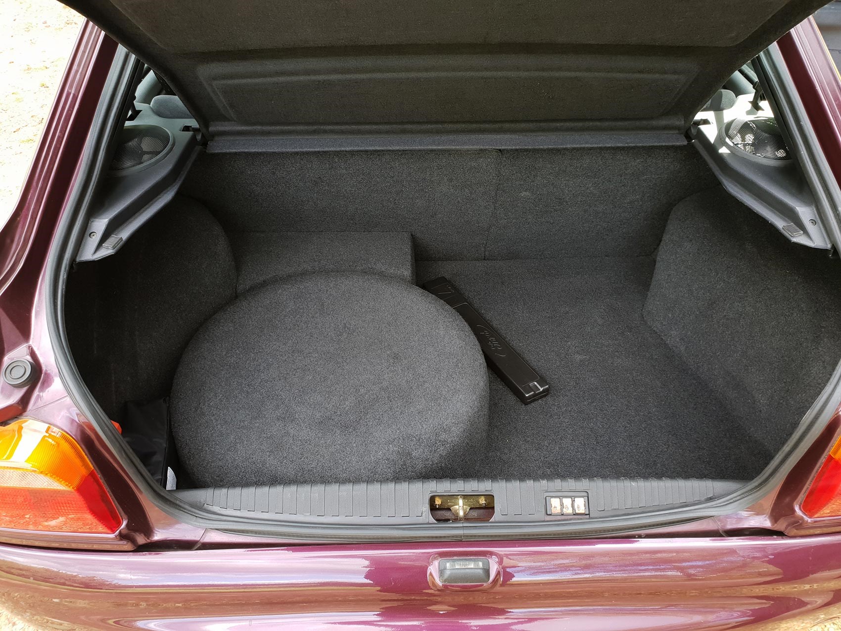 Ford Escort Cosworth boot is dominated by the spare wheel Ford Escort Cosworth boot is dominated by the spare wheel