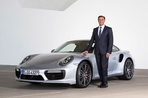 Porsche R&amp;D chief Michael Steiner with a petrol-powered 911