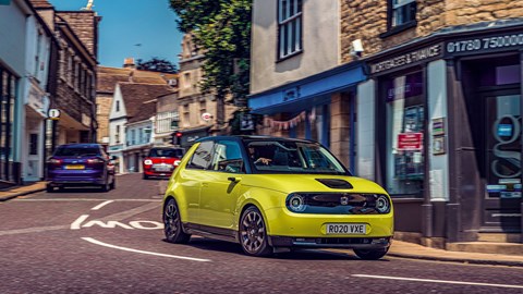 Honda E heads through Stamford streets