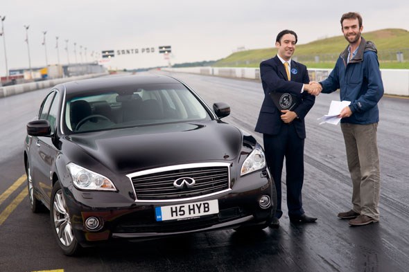 The record breaking hybrid run: the man from Guinness World Records presents Tim Pollard with his certificate