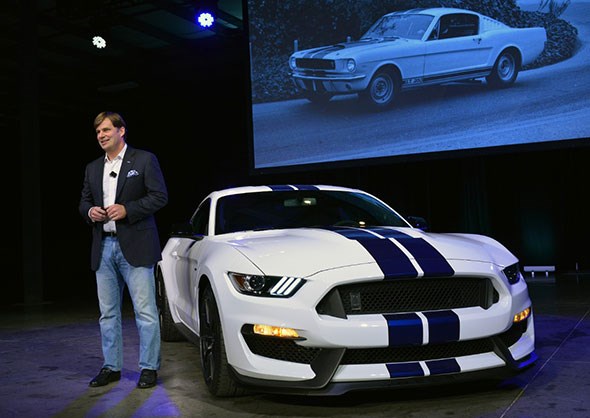 Ford's global sales and marketing vice president Jim Farley with the Ford Shelby GT350 Mustang