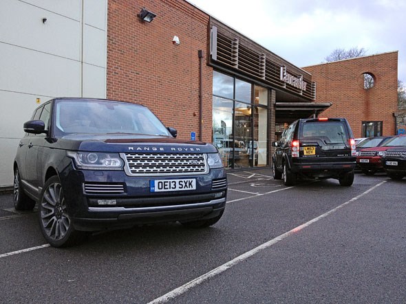 Range Rover meets a Land Rover dealership. Hopefully not to prove a frequent event in our year together