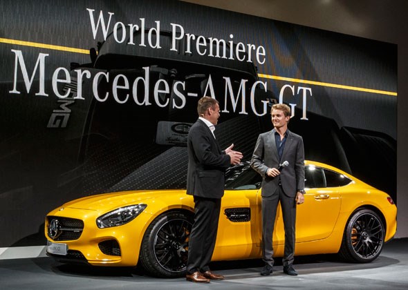 Nico Rosberg and Tobias Moers, head of AMG, on stage with Mercedes AMG GT