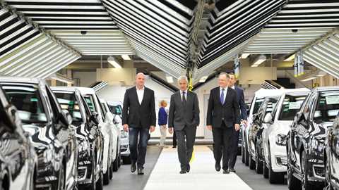 VW chief Matthias Mueller (centre) with union and local government leaders