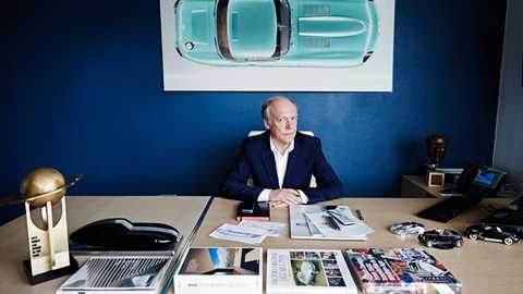 Ian Callum at work at his desk