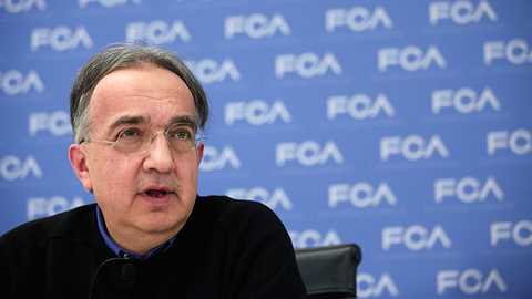 Fiat Chriysler chief Sergio Marchionne talks to reporters at the 2015 Detroit auto show (pic by Getty)