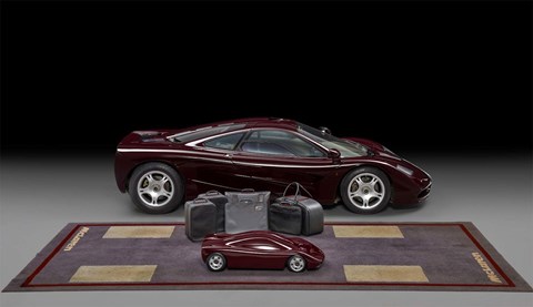 Rowan Atkinson's McLaren F1 comes with its own luggage set, a model and a £1600 mat he saw on a visit to the factory