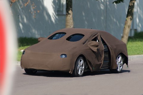 Audi A7 wearing a blanket