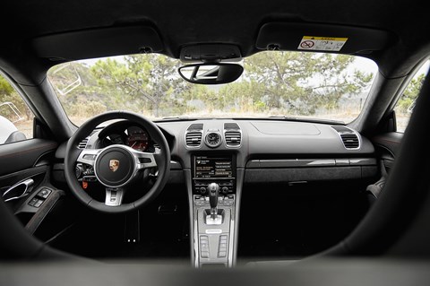 Inside the Porsche Cayman GTS cabin. Sensible, sober, seductive