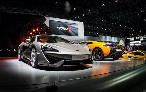 A pair of McLaren 570S supercars on the stand in New York