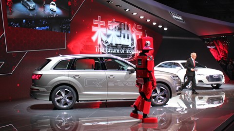 Ulrich Hackenberg from VW Group and an Audi robot. Only in China...