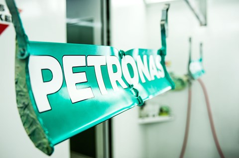 Petronas logo's aren't stickers, they are painted on