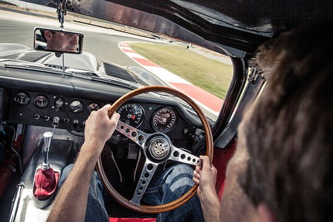 Our man Ben Barry behind the £1million lightweight E-type