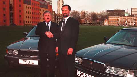 Yours for £800m. British Aerospace’s Dick Evans shakes on it with BMW’s Pischetsrieder