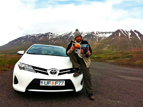 Pepe takes a moment in the Icelandic landscape to catch up on the previous month's issue of CAR