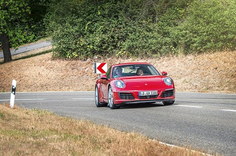 911 project boss August Achleitner gets his new toy out of shape with our Georg on board. ‘Send me this picture!’