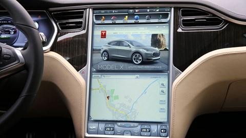 Gargantuan touchscreen still the cabin's centrepiece. Also handy for product placement
