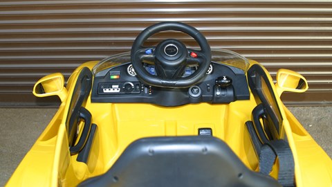 Inside the cabin of the Ride On McLaren P1. Plastics not very soft-touch