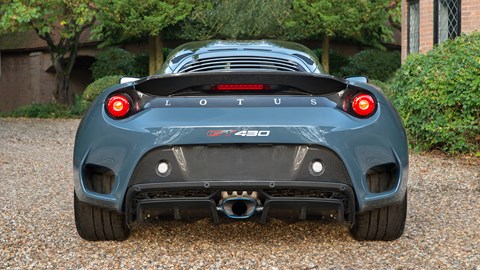 Even without the rear wing, there's still 100kg of downforce acting here. Rear tyres visible through new extra vent-y bumper