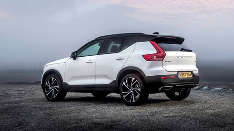 Note the kicked-up C-pillar on the Volvo XC40 rear door