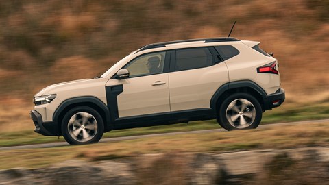 Dacia Duster review - side, driving