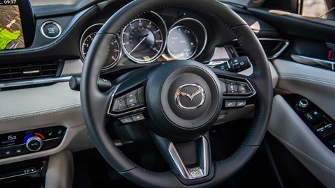Steering wheel and cabin of new Mazda 6
