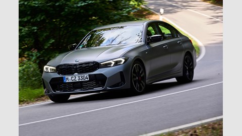 BMW 3-series review - front, silver, driving round corner