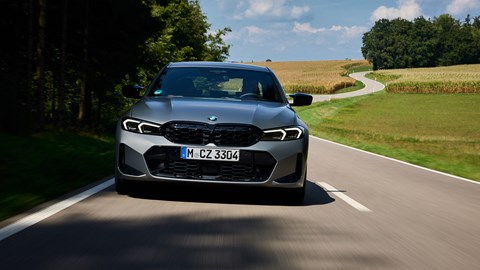 BMW 3-series review - dead-on front, silver, driving