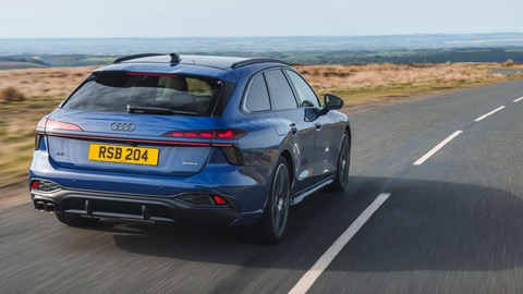 Audi A6 Avant review - UK, blue, rear, driving in countryside