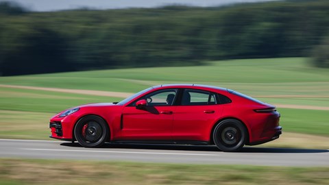 Porsche Panamera GTS: side view driving, red paint