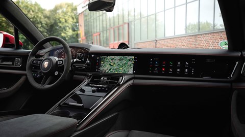 Porsche Panamera GTS: dashboard and infotainment system, black upholstery