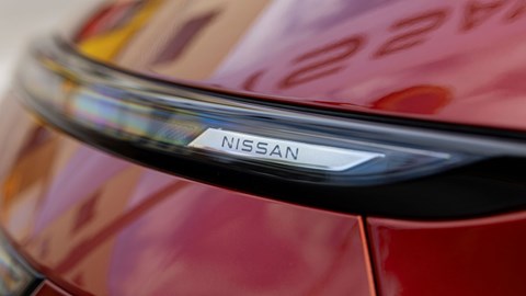 Nissan Qashqai e-Power (2025) review: headlight badge detail, red paint