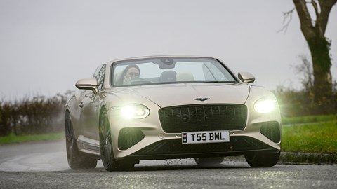 Bentley Continental GT Convertible (2025) review: front three quarter cornering, beige paint, roof down