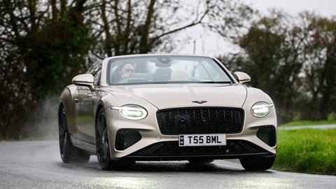 Bentley Continental GT Convertible (2025) review: front three quarter cornering, beige paint, roof down