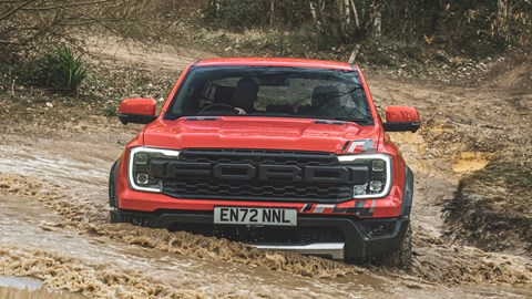 Ford Ranger Raptor (2023) review: fording through deep water, orange paint
