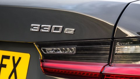 BMW 330e (2024) review: rear badge, grey paint