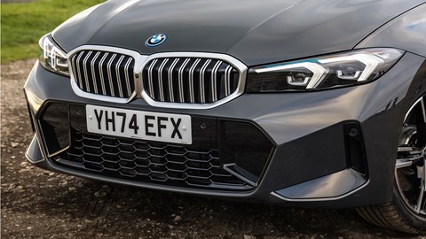BMW 330e (2024) review: front end static, grey paint