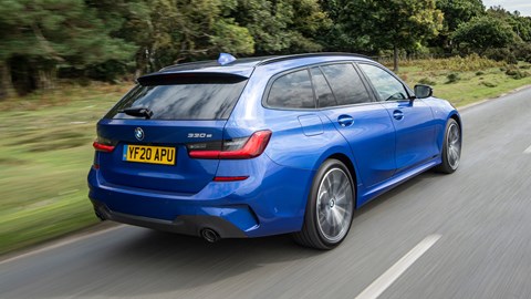 BMW 330e Touring review - plug-in hybrid BMW, blue, estate, rear view, driving