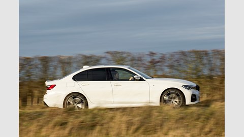 BMW 330e driving, side 2019