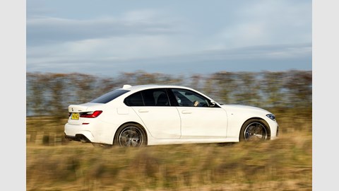 BMW 330e driving rear 2019